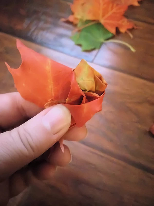 fold one side of the leaf under thumb